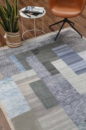 Grey and beige abstract blocks on a modern carpet by Carpet Cellar
