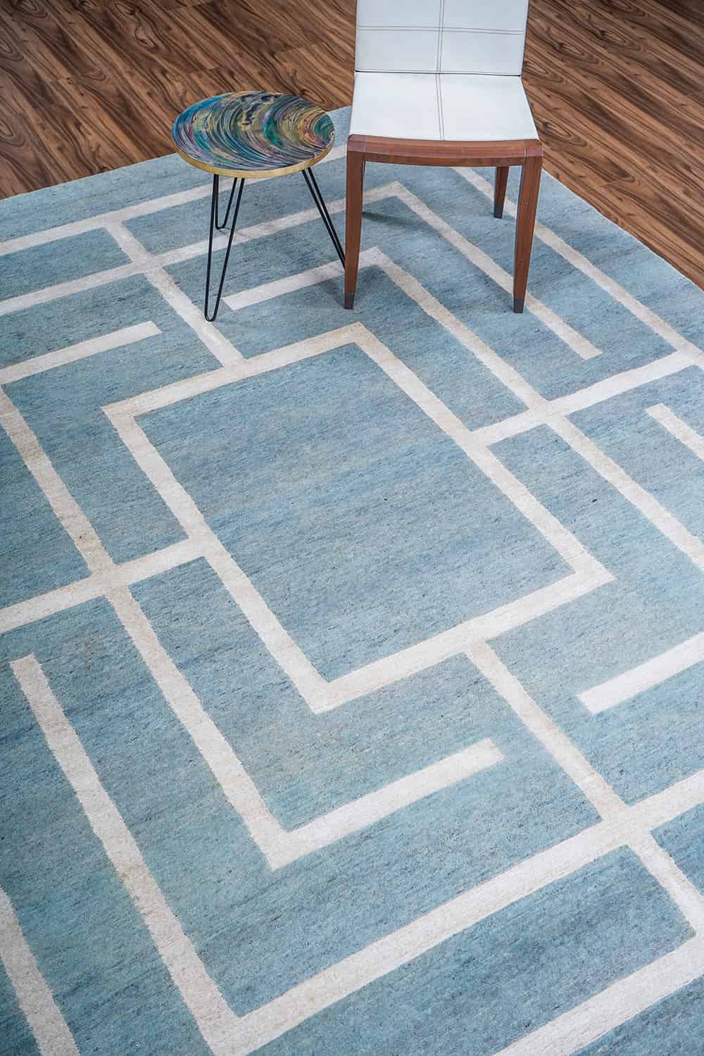 Alternating fabrics of wool and silk in a grey modern carpet by Carpet Cellar