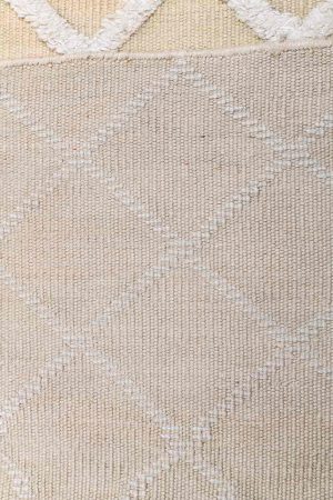 Beige and off-white flatweave rug made from handwoven wool by Carpet Cellar
