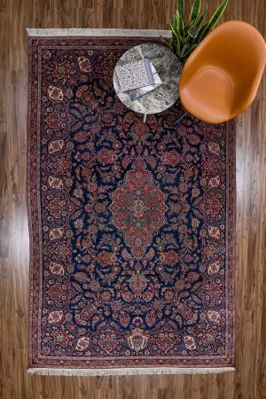dark blue and pink handcrafted Antique Persian Carpets made from Wool by Carpet Cellar